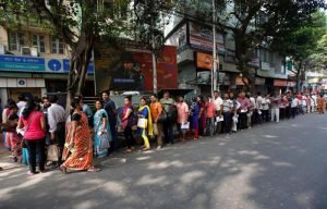 people-stand-enter-kolkata-bank-they-wait_a83082ae-a707-11e6-9005-31625660f15f